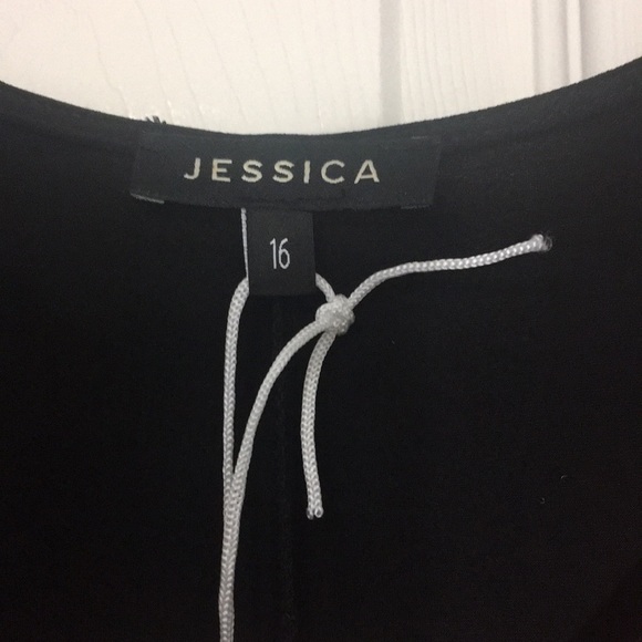 Women’s size Large mid length black dress with long bell sleeves and V neck - Picture 4 of 7